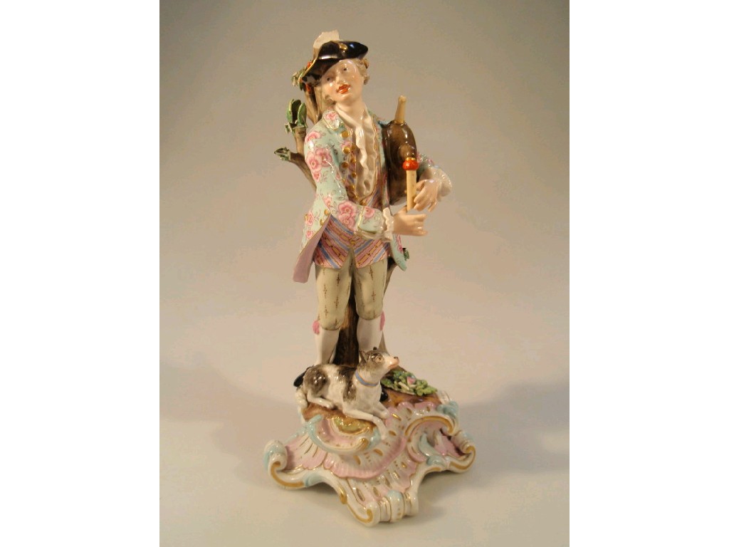 Appraisal: A Meissen figure of a youth playing the bag pipes