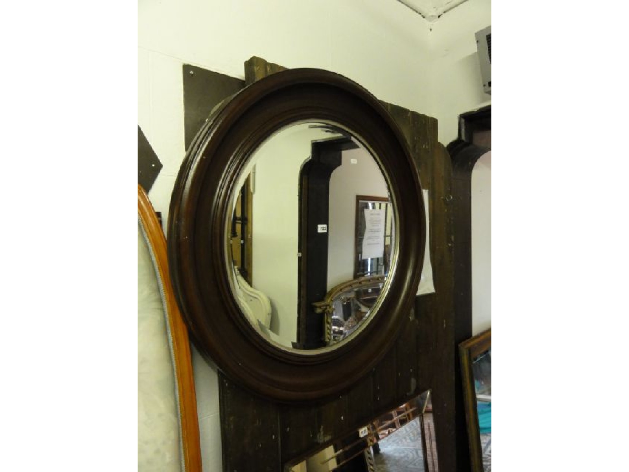 Appraisal: A large contemporary wall mirror of circular form with moulded