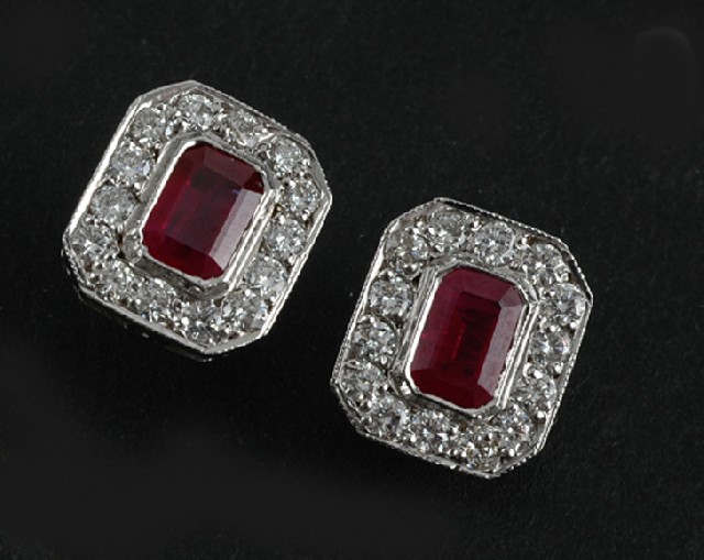 Appraisal: A pair of ruby and diamond plaque earrings Each ct