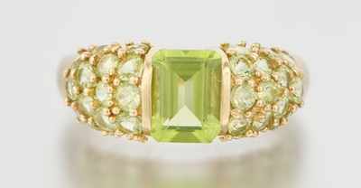 Appraisal: A Ladies' Peridot Ring k yellow gold ring with domed