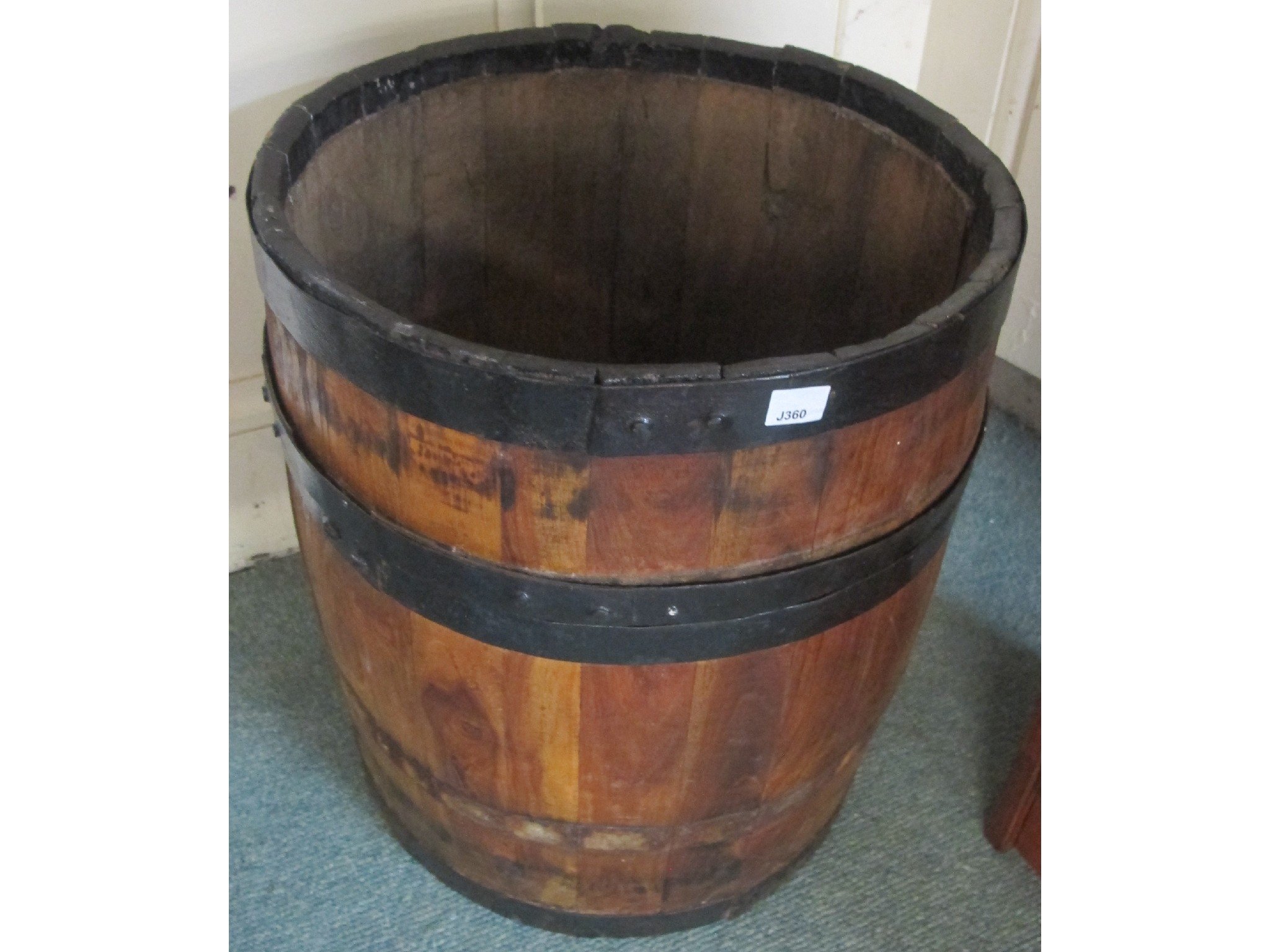 Appraisal: An oak barrel converted to a stick stand