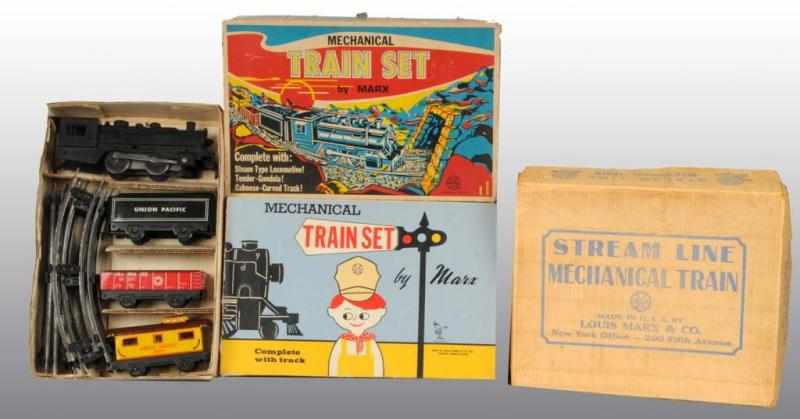 Appraisal: Lot of Tin Marx Wind-Up Train Sets Description American All