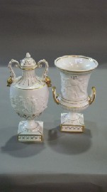 Appraisal: A Naples white porcelain vase with gold rims and decorated