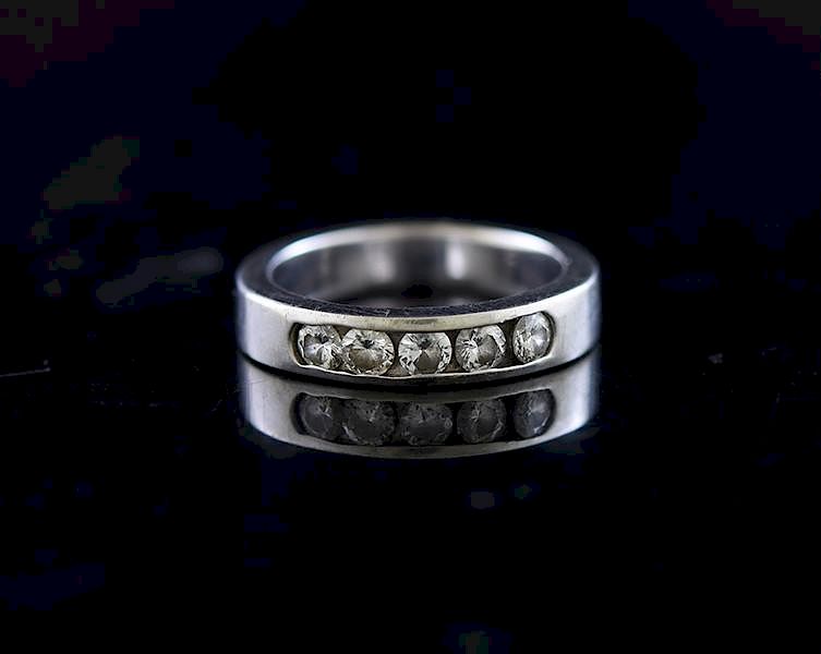 Appraisal: k white gold and diamond man's band k white gold