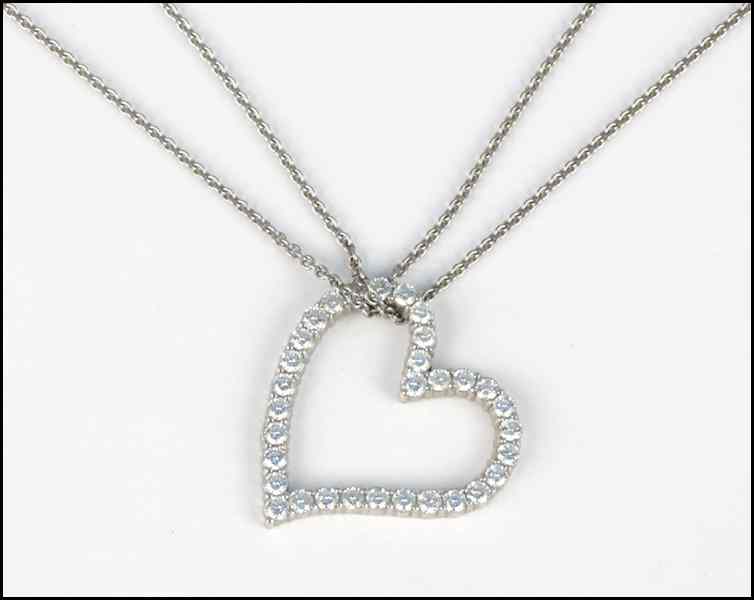 Appraisal: WHITE GOLD DIAMOND HEART PENDANT ON AN KARAT WHITE GOLD