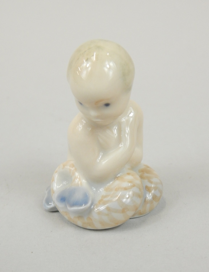 Appraisal: A Royal Copenhagen figure of a mermaid number cm high