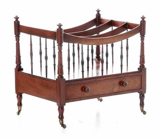 Appraisal: Regency mahogany canterbury circa turned spindles support concave dividers above