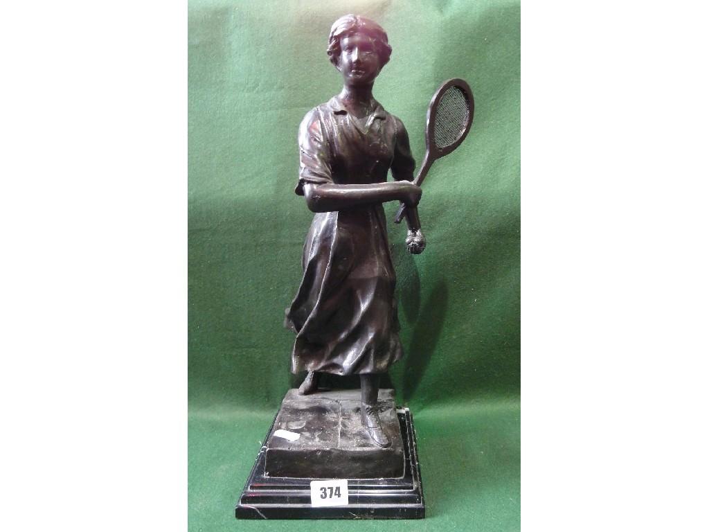 Appraisal: A cast figure of a woman tennis player preparing to