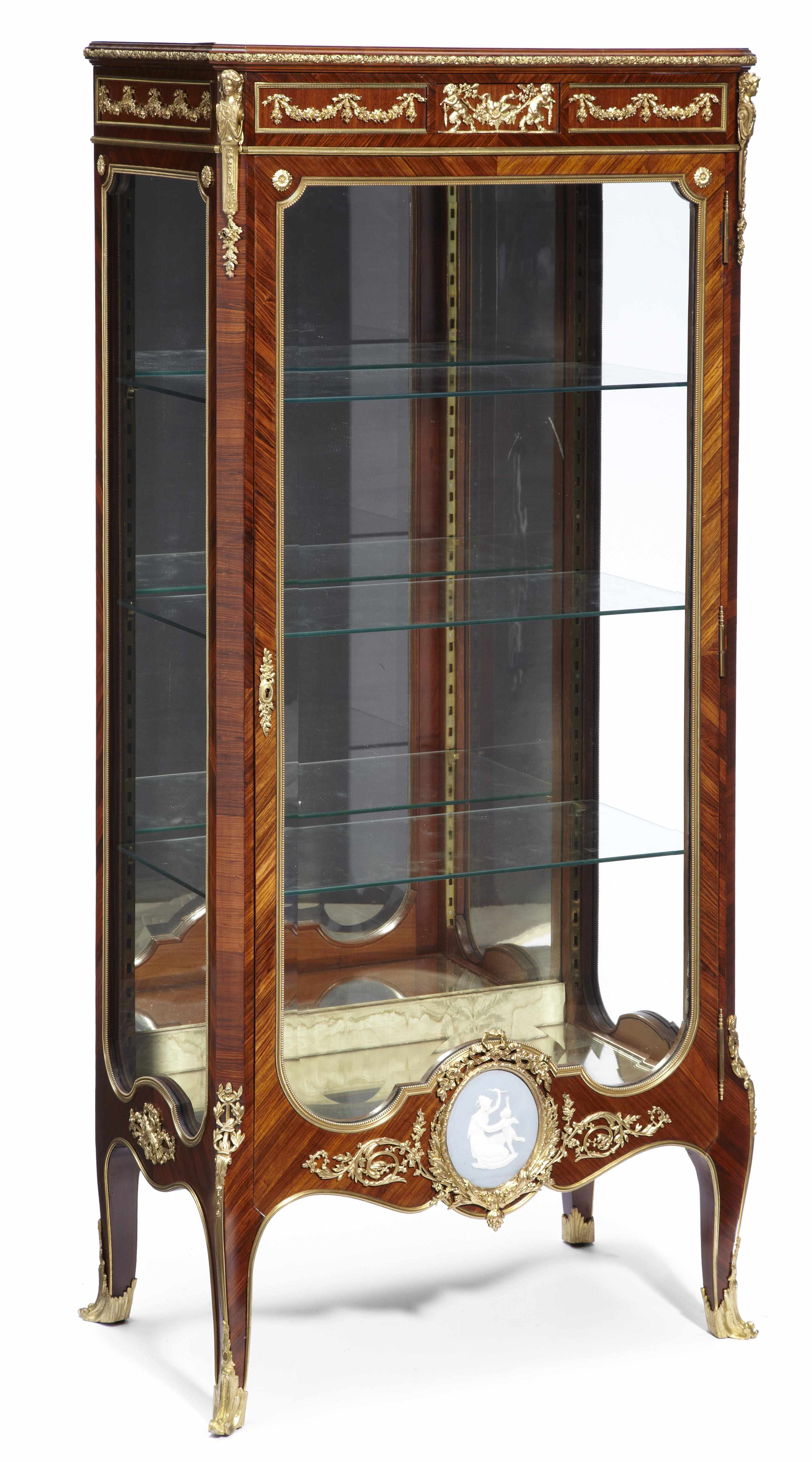 Appraisal: A Louis XVI style gilt bronze mounted kingwood vitrine late