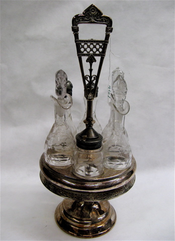 Appraisal: AN AMERICAN SILVER PLATED CASTOR SET having six etched glass