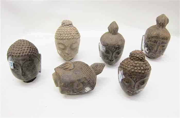 Appraisal: SIX CARVED GRANITE BUDDHA HEADS all have down cast eyes