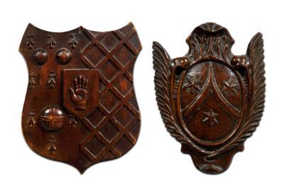 Appraisal: Two carved wooden shields one with stars in oval central