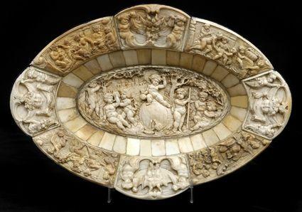 Appraisal: CONTINENTAL CARVED IVORY DISH IN THE TH C STYLE The