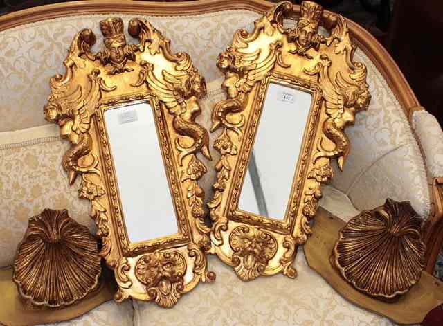 Appraisal: A PAIR OF VENETIAN STYLE GILT FRAMED RECTANGULAR WALL MIRRORS