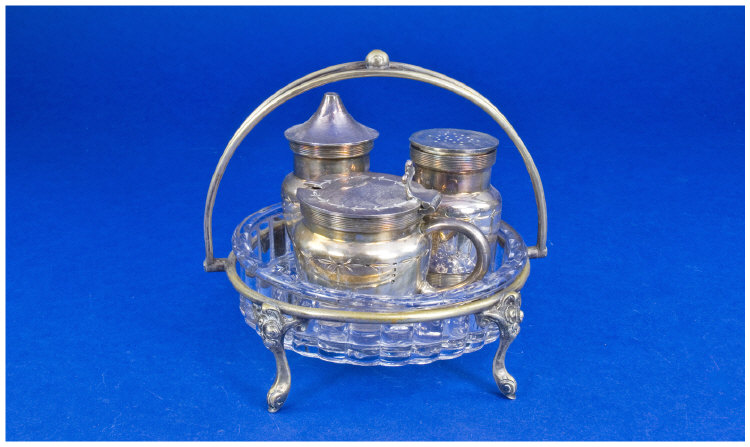 Appraisal: Silver Plated Condiment Set with glass bowl and swing handled