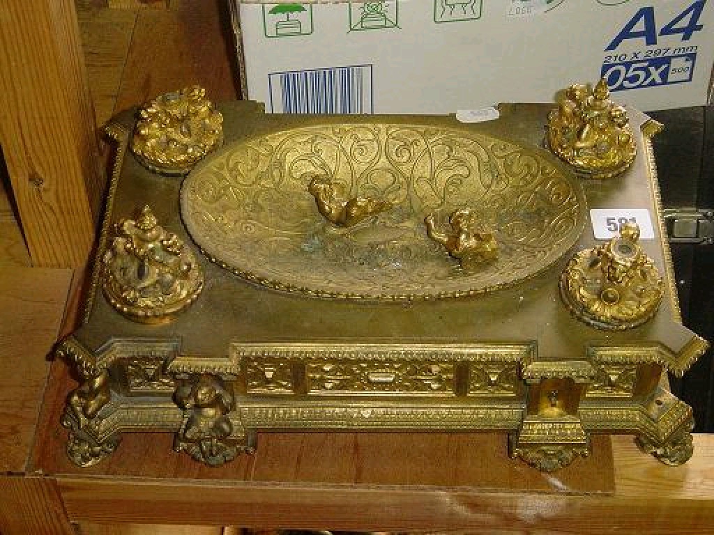 Appraisal: A highly decorative continental gilt metal ink stand decorated with