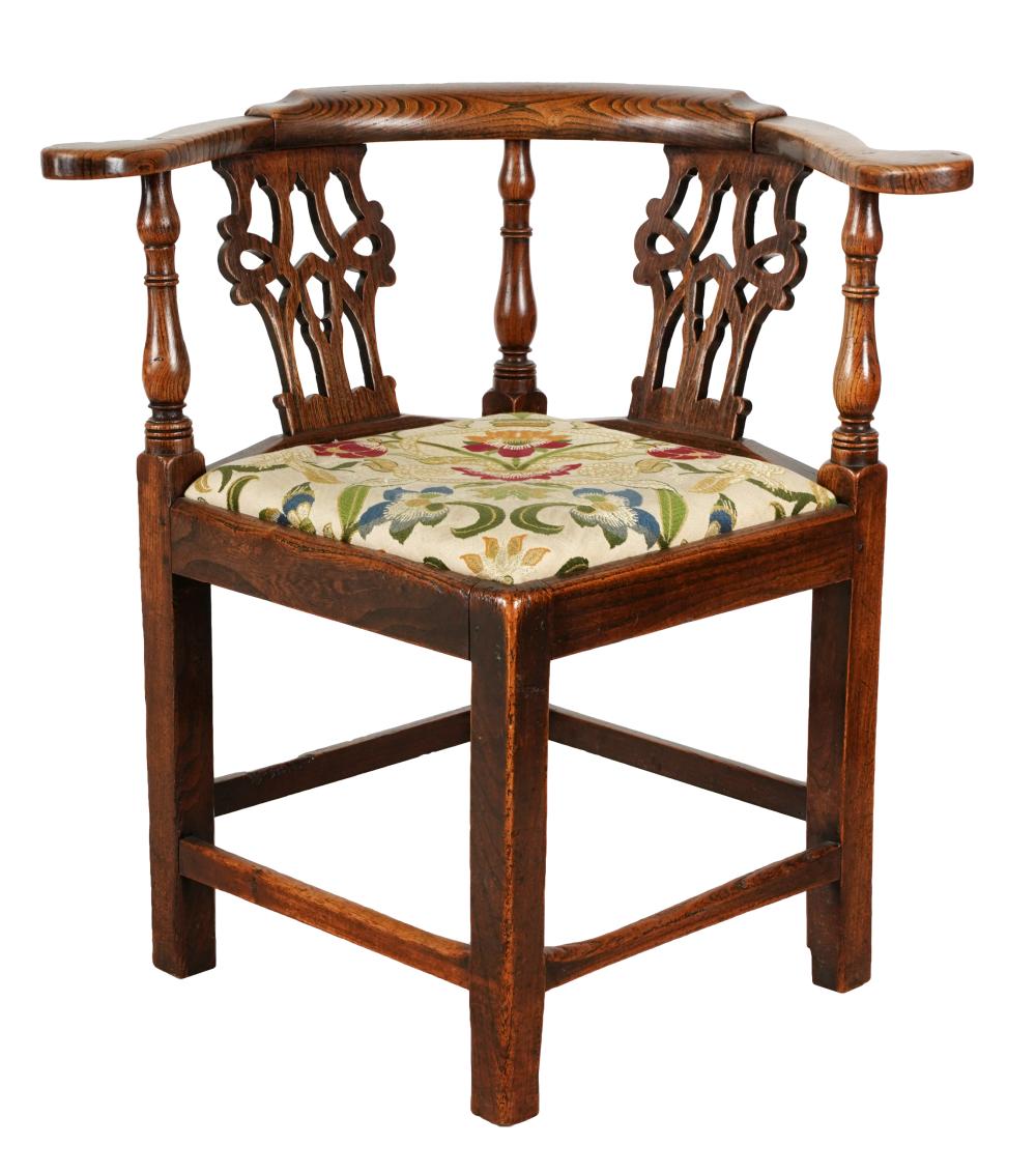 Appraisal: GEORGIAN OAK CORNER CHAIRthe seat covered with floral fabric inches