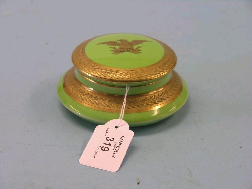 Appraisal: A French porcelain powder box burnished gilt borders and eagle