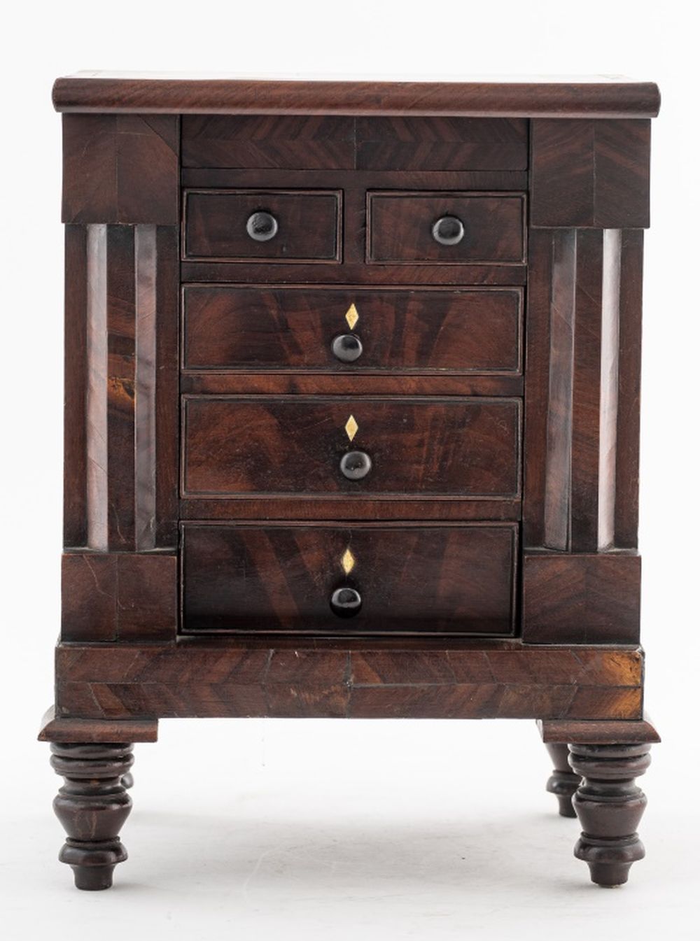 Appraisal: VICTORIAN DIMINUTIVE CHEST OF DRAWERS Victorian diminutive chest of drawers