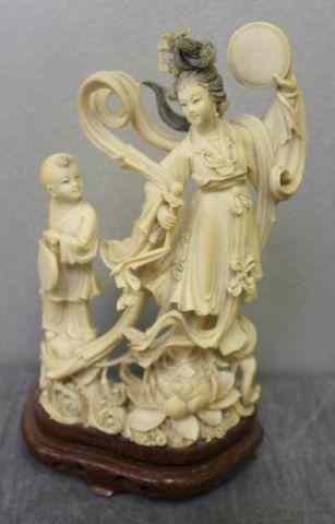 Appraisal: Ivory Figure of a Dancing Woman with Boy From a