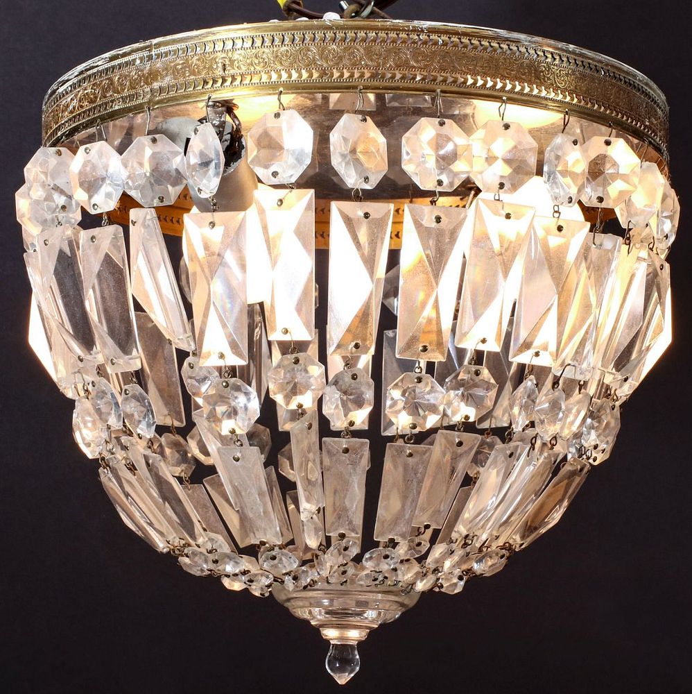 Appraisal: A BRASS AND CRYSTAL CEILING LIGHT FIXTURE Brass guilloche patterned