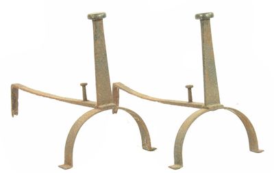 Appraisal: A pair of wrought iron andirons the fronts with flattened