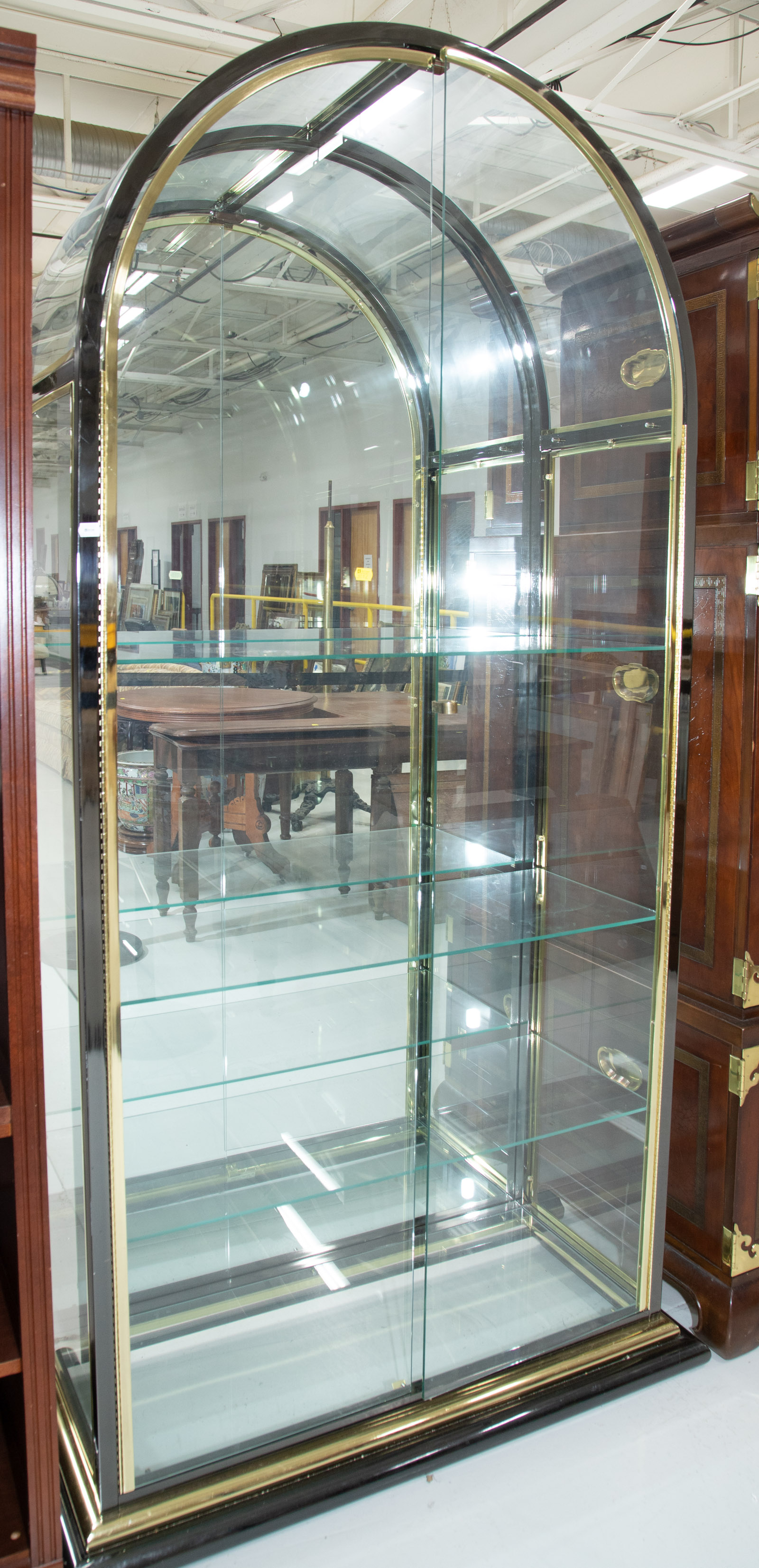 Appraisal: CONTEMPORARY GLASS METAL CURIO CABINET With glass shelves approximately in