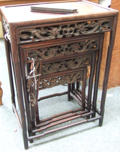 Appraisal: A nest of four Chinese hardwood occasional tables each with