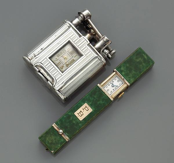 Appraisal: A sterling silver watch-lighter together with a enamel slide watch