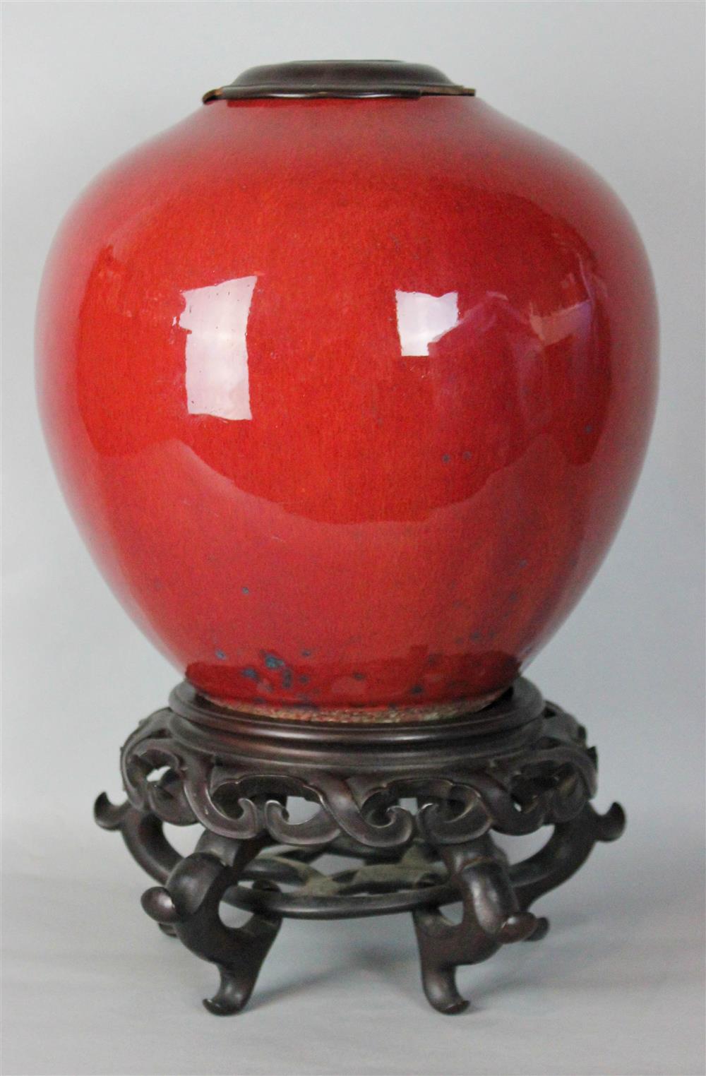 Appraisal: CHINESE SANG-DE-BOEUF-GLAZED OVOID JAR of simple shape and covered in