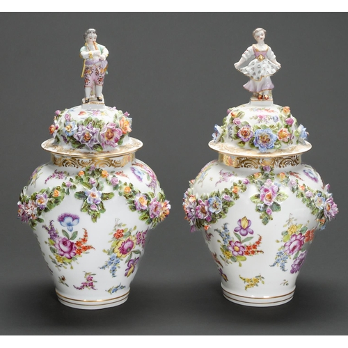 Appraisal: A pair of Bourdois Bloch floral encrusted jars and covers