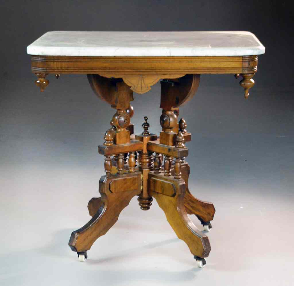 Appraisal: Eastlake Marble Top TableFinely decorated with drop finials carvings and