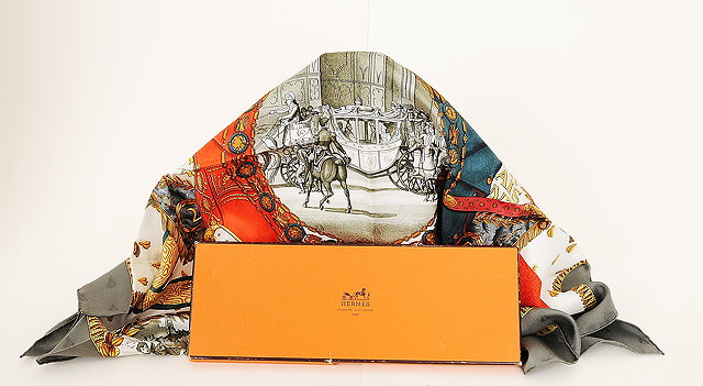 Appraisal: A Herm s silk scarf with 'Napoleon' print designed by