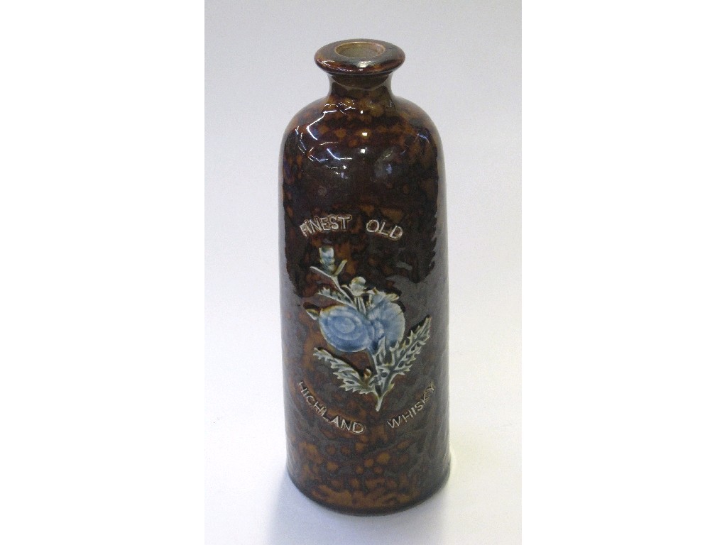 Appraisal: Finest Old Highland Whisky' stoneware cylindrical decanter with raised flowering