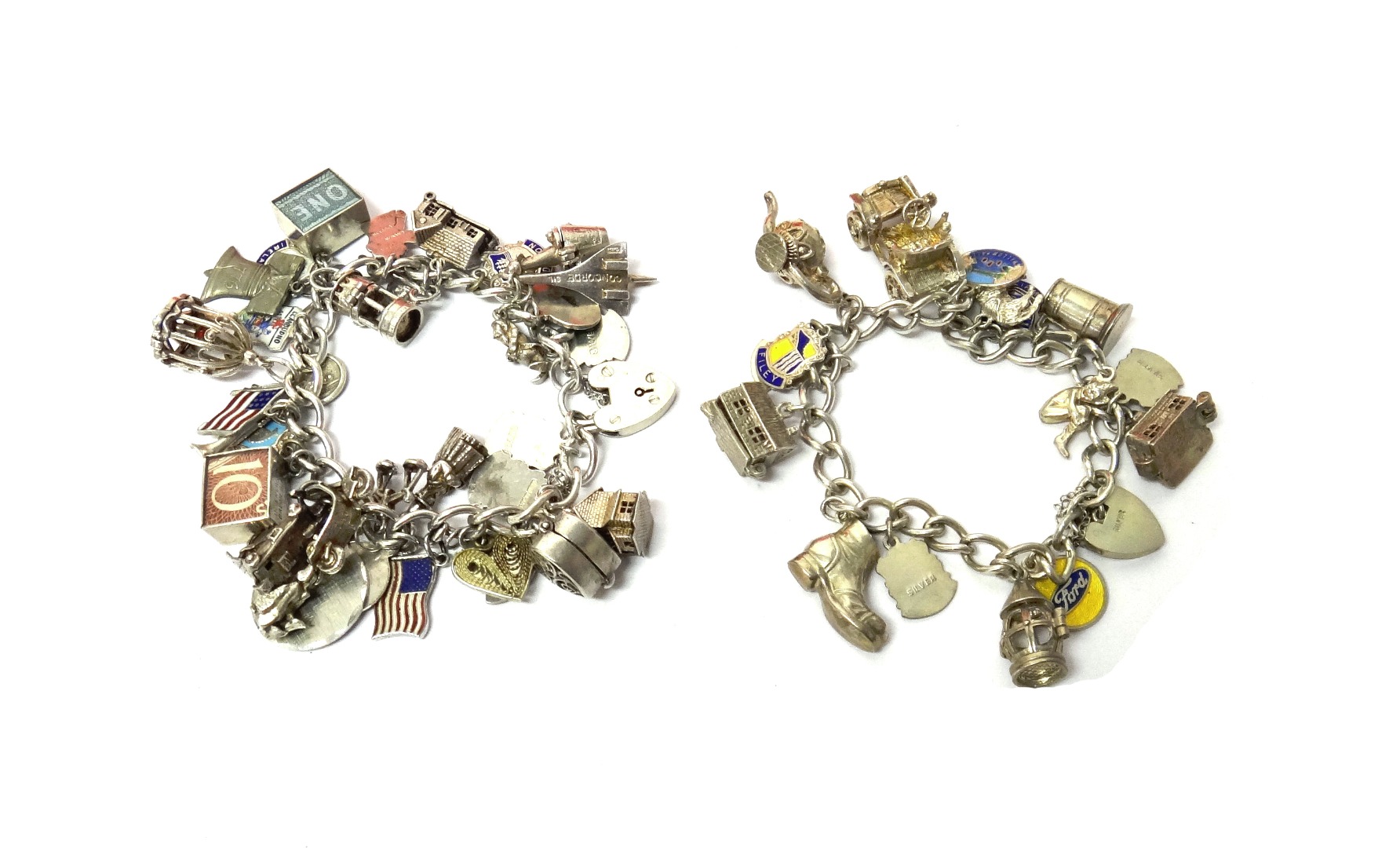 Appraisal: Two silver curb link charm bracelets each with a heart