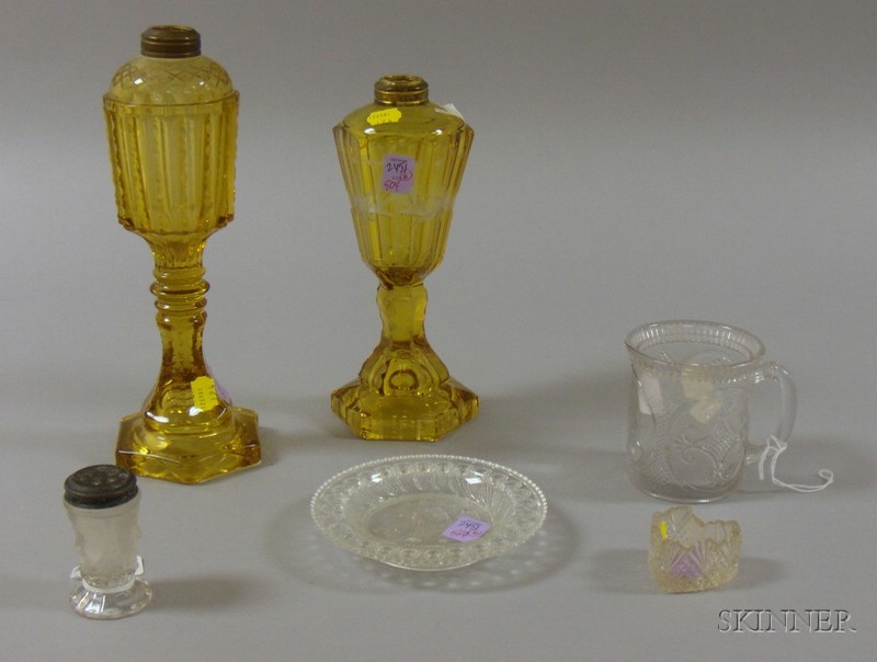 Appraisal: Two Amber Etched and Cut Glass Fluid Lamps and Four