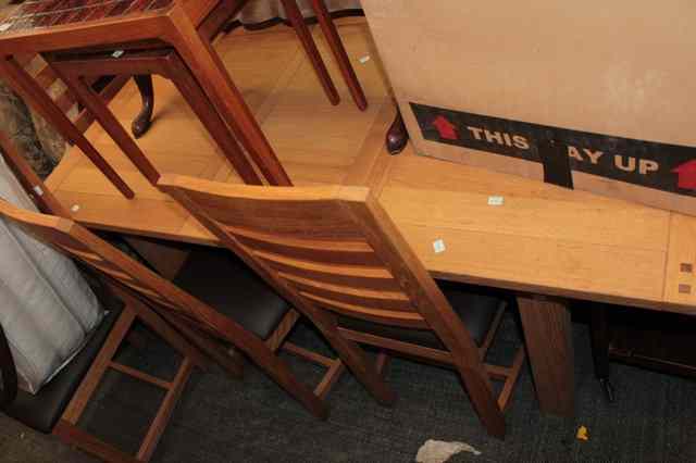 Appraisal: A LATE TH CENTURY OAK DINING SUITE the extending table