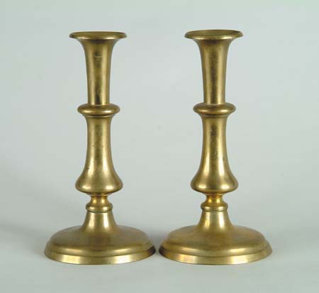 Appraisal: PAIR OF ROUND BASE PUSHUP BRASS CANDLESTICKS Pushups present th