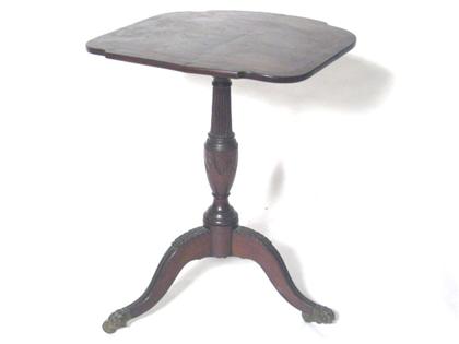 Appraisal: Mahogany Tilt top candle stand Shaped top with vasiform support