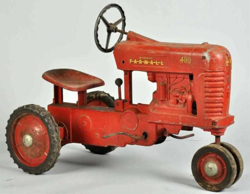 Appraisal: Pressed Steel McCormick Farmall Pedal Tractor Toy Description Circa s