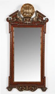 Appraisal: h carved and parcel gilt mahogany mirror Carved and parcel