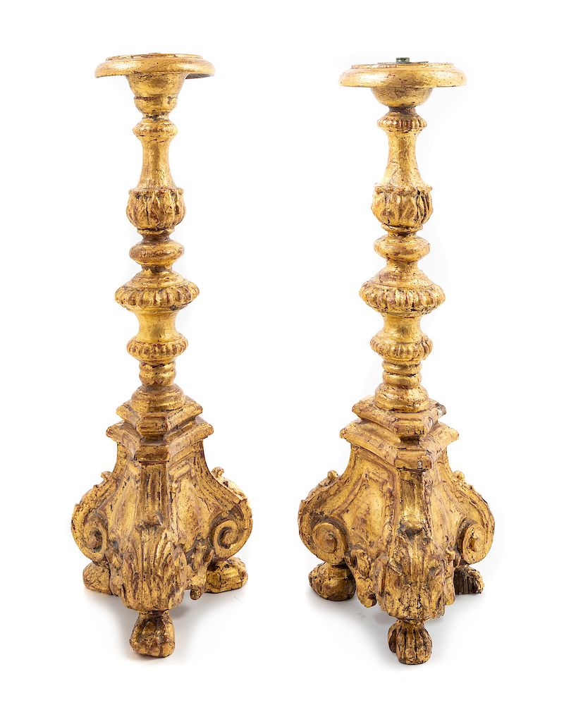 Appraisal: A Pair of Italian Giltwood Prickets A Pair of Italian