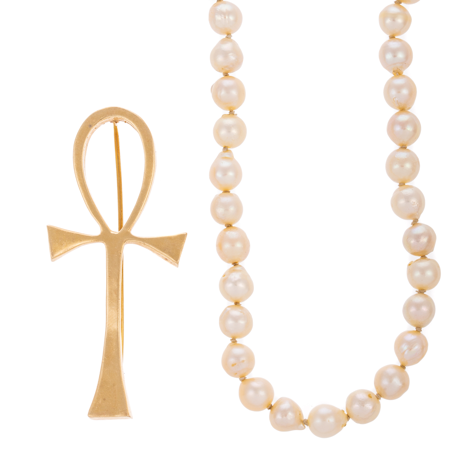 Appraisal: A K ANKH BROOCH STRAND OF PEARLS K yellow gold