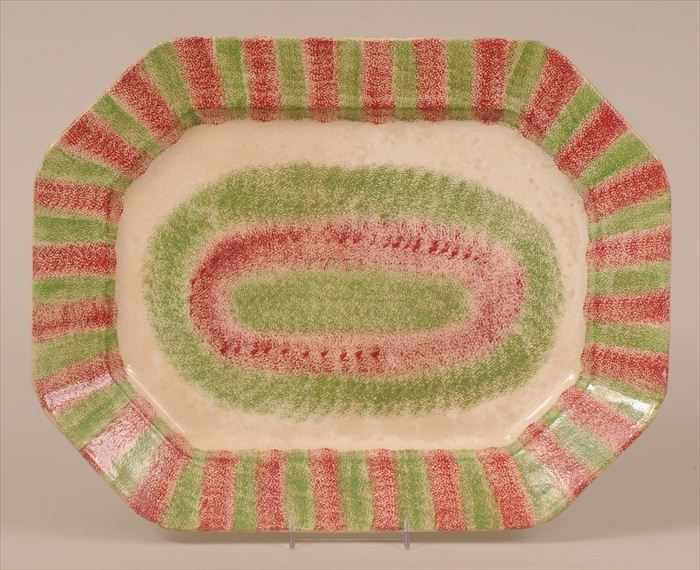 Appraisal: STAFFORDSHIRE RED AND GREEN SPATTERWARE PLATTER Octagonal form with border