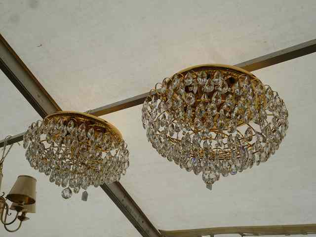 Appraisal: A PAIR OF GILT METAL CEILING LIGHTS with tears of