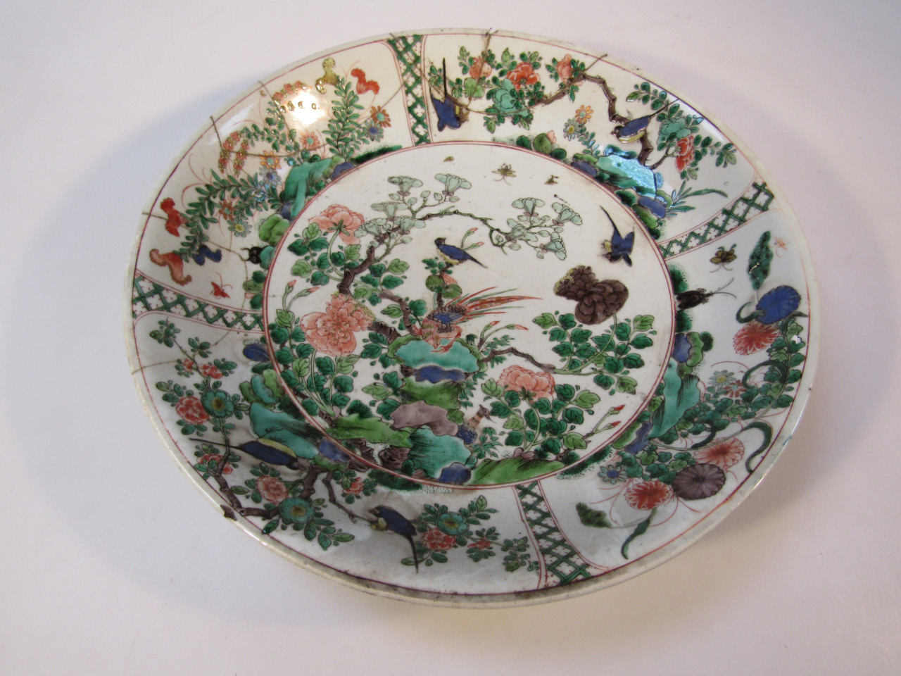 Appraisal: A Chinese porcelain charger polychrome decorated with exotic birds tree