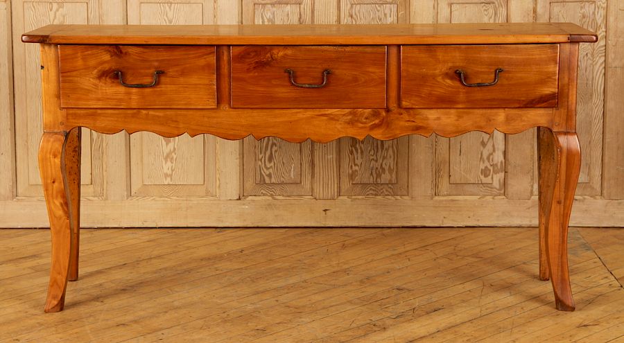 Appraisal: THREE DRAWER CHERRY PROVINCIAL CONSOLE TABLE A three drawer cherry