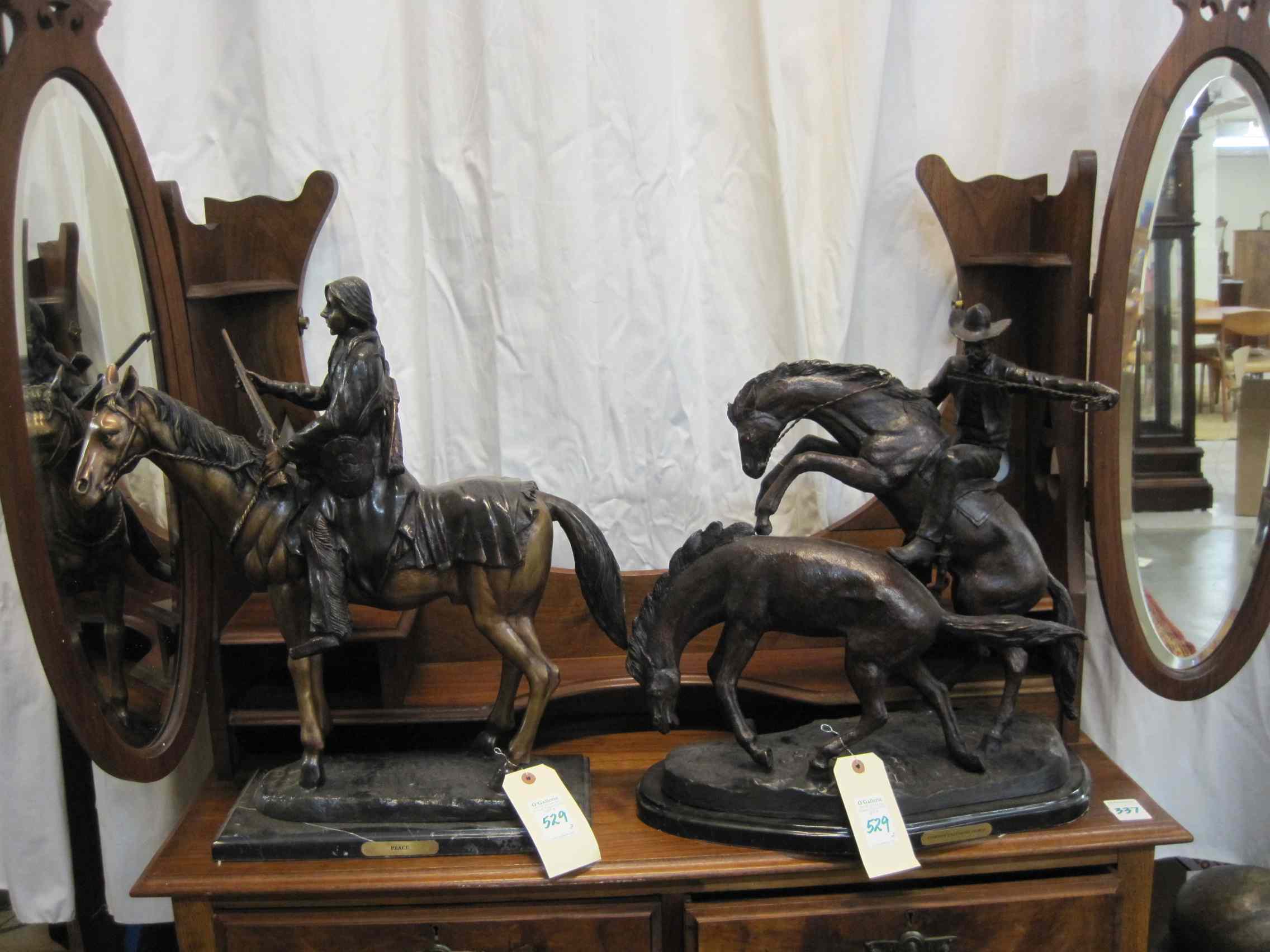 Appraisal: TWO WESTERN BRONZE SCULPTURES ''Peace '' a Native American Indian