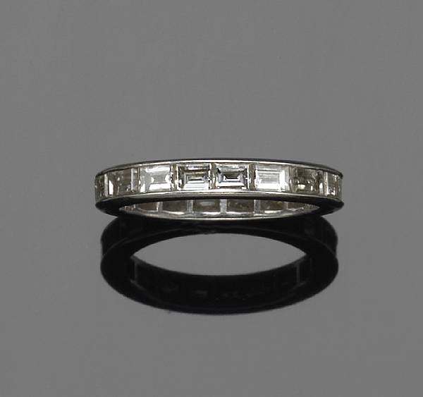 Appraisal: A diamond and platinum eternity band estimated total diamond weight