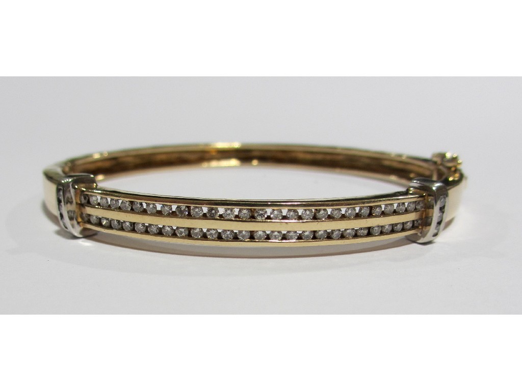 Appraisal: A ct gold set diamond bangle with a double row